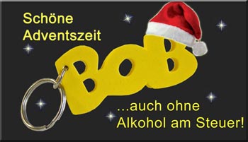 BOB-Anhänger mit Weihnachtsmütze und dem Schriftzug: Schöne Adventszeit auch ohne Alkohol am Steuer!